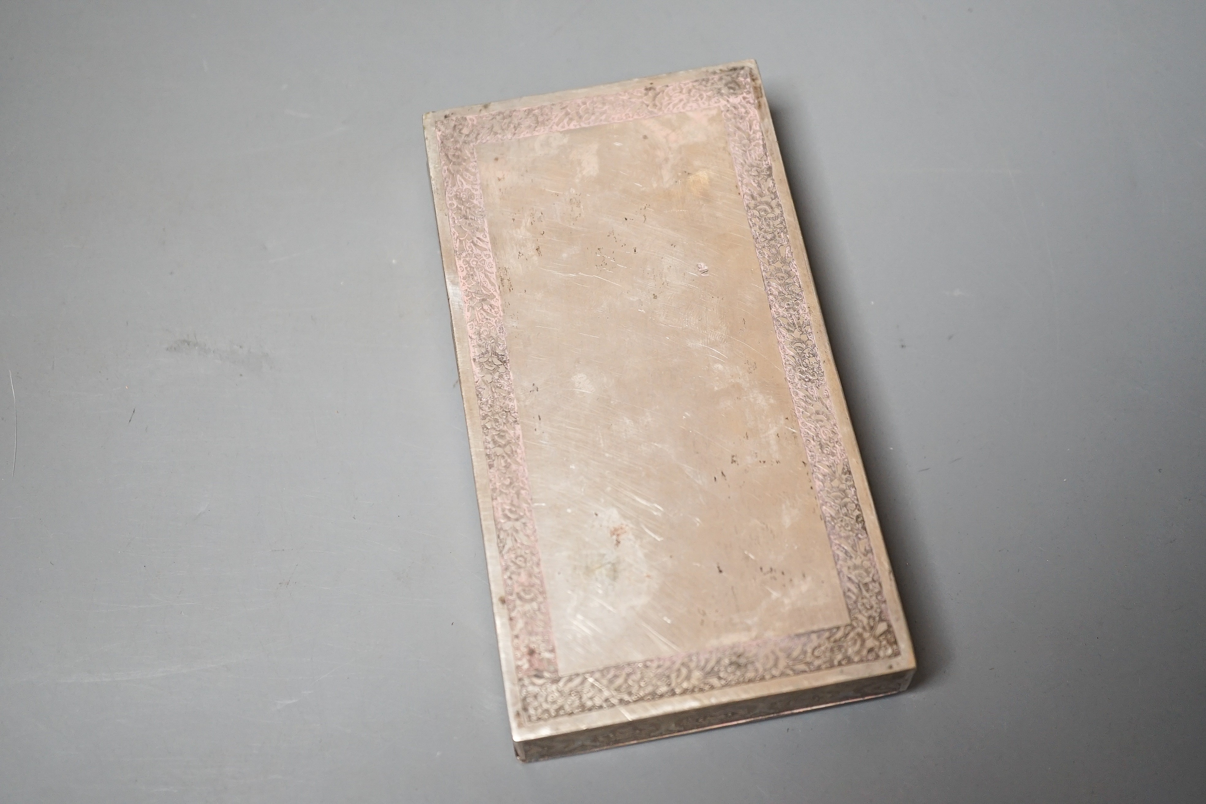 A Persian white metal box with inset miniature lid, 13.8cm.